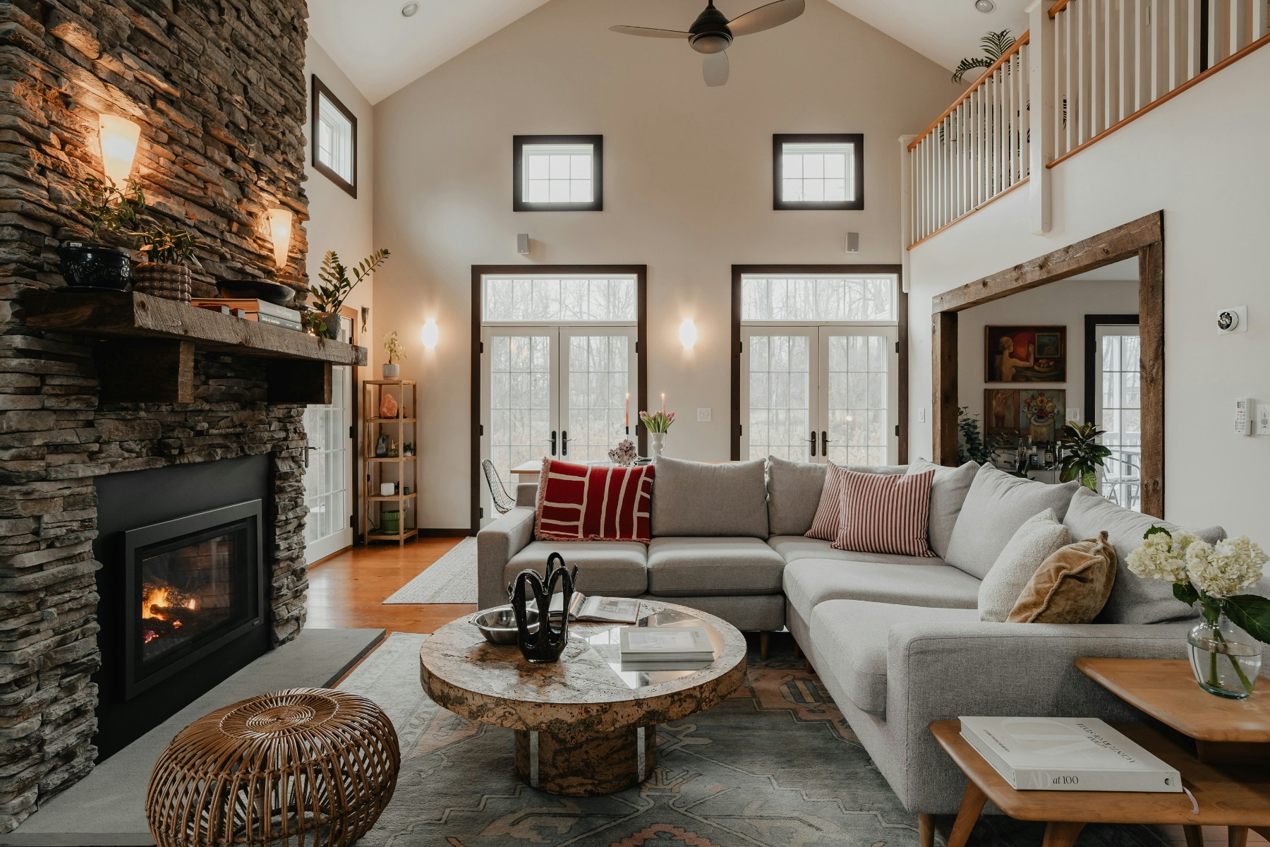 Large living room with furniture and fireplace