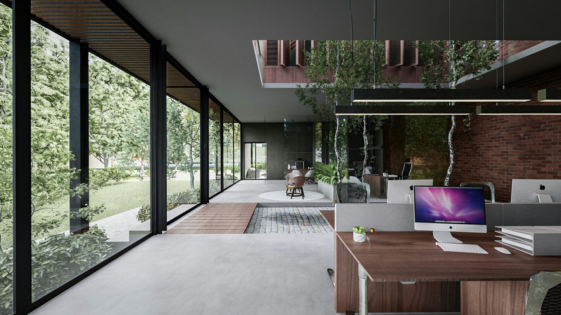 Spacey office with laptops, desks and plants