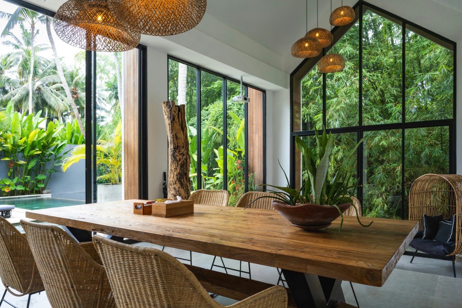 Dining room with large wooden table and other wooden features